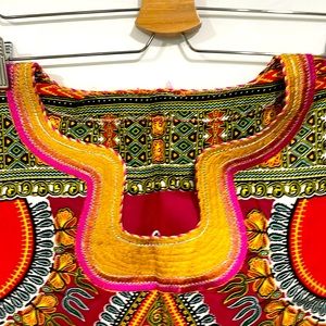 Dashiki dress
Free flowing 
Made with ankara cloth